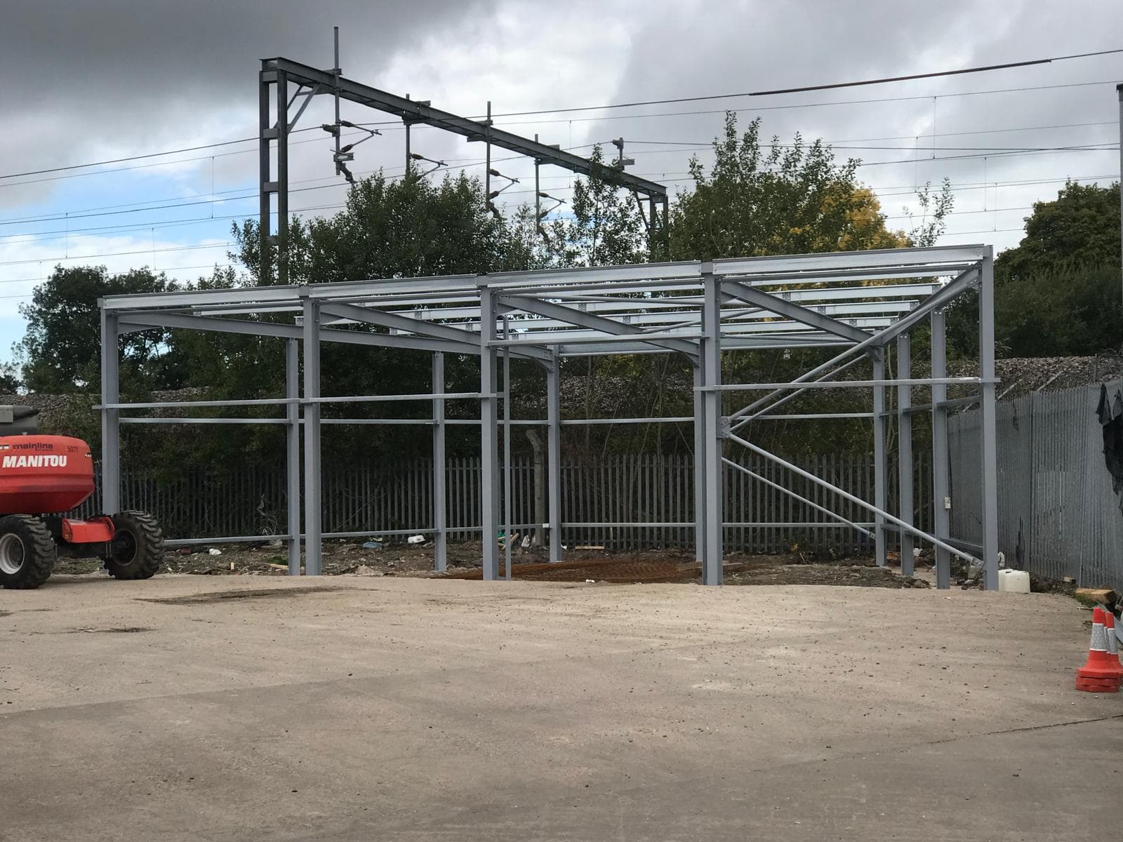 Small commercial steel frame unit during erection